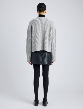 Proenza Schouler Back full length image of model wearing Azura Sweater in Moulinex Knits in PEBBLE MELANGE