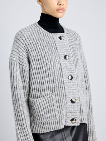 Proenza Schouler Detail image of model wearing Azura Sweater in Moulinex Knits in PEBBLE MELANGE