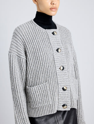 Proenza Schouler Detail image of model wearing Azura Sweater in Moulinex Knits in PEBBLE MELANGE