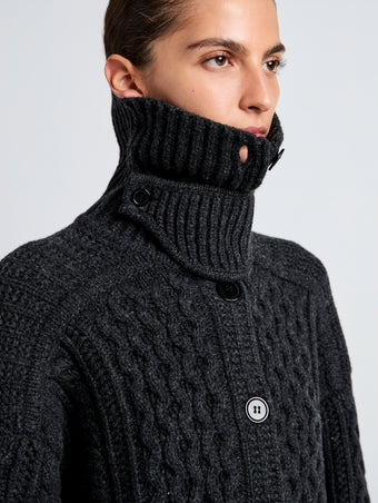 Proenza Schouler detail image of model wearing Darlene Sweater in Cable Knit in COAL