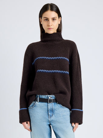 Proenza Schouler cropped front image of model wearing Anne Fairisle Sweater in Merino Wool in CACAO/NAVY/CORNFLOWER