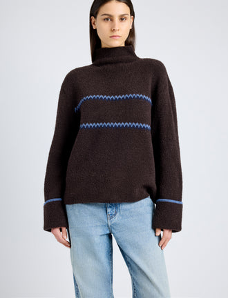 Proenza Schouler detail image of model wearing Anne Fairisle Sweater in Merino Wool in CACAO/NAVY/CORNFLOWER