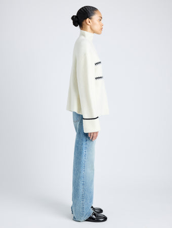 Proenza Schouler side image of model wearing Anne Fairisle Sweater in Merino Wool in WHITE/BLACK/COAL