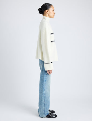 Proenza Schouler side image of model wearing Anne Fairisle Sweater in Merino Wool in WHITE/BLACK/COAL