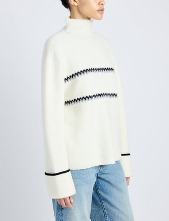 Proenza Schouler detail image of model wearing Anne Fairisle Sweater in Merino Wool in WHITE/BLACK/COAL