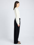 Proenza Schouler Side full length image of model wearing Carolina Sweater in Souffle Knit in ALABASTER