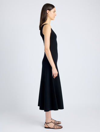 Proenza Schouler Side full length image of model wearing Lucia Dress in Souffle Knit in BLACK