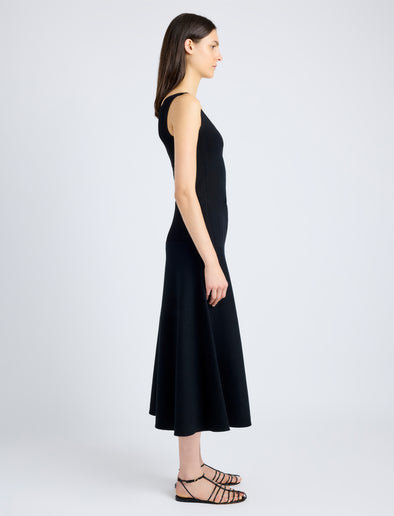 Proenza Schouler Side full length image of model wearing Lucia Dress in Souffle Knit in BLACK