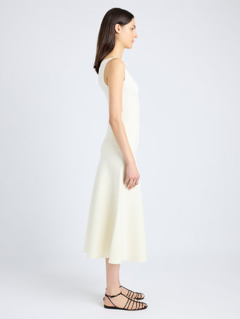 Proenza Schouler Side full length image of model wearing Lucia Dress in Souffle Knit in ALABASTER