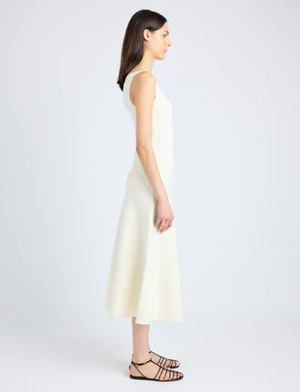 Proenza Schouler Side full length image of model wearing Lucia Dress in Souffle Knit in ALABASTER