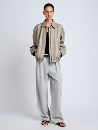 Proenza Schouler Front full length image of model wearing Beck Bomber in Lightweight Nappa in Granite