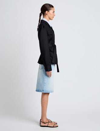 Proenza Schouler Side full length image of model wearing Indie Jacket in Stretch Cotton Suiting in Black