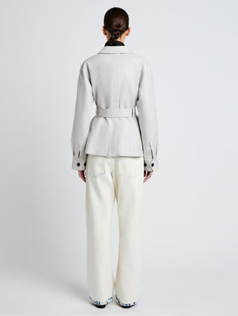 Proenza Schouler Back full length image of model wearing Indie Jacket in Stretch Cotton Suiting in Pale Grey