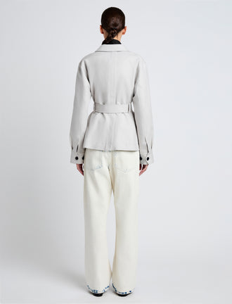 Proenza Schouler Back full length image of model wearing Indie Jacket in Stretch Cotton Suiting in Pale Grey