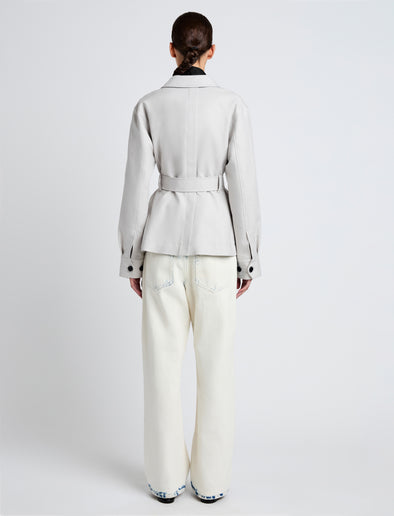 Proenza Schouler Back full length image of model wearing Indie Jacket in Stretch Cotton Suiting in Pale Grey