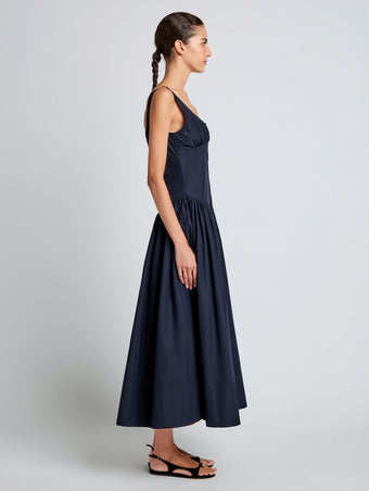 Proenza Schouler Side full length image of model wearing Kendall Dress in Tech Cotton in Navy