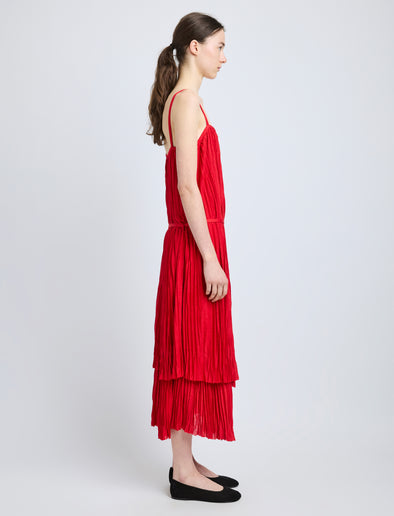 Proenza Schouler Side full length image of model wearing Clyne Dress in Pleated Jersey in Dark Poppy