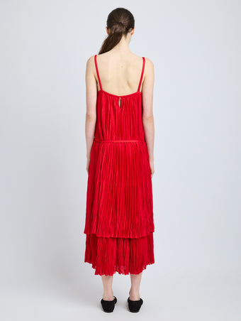 Proenza Schouler Back full length image of model wearing Clyne Dress in Pleated Jersey in Dark Poppy