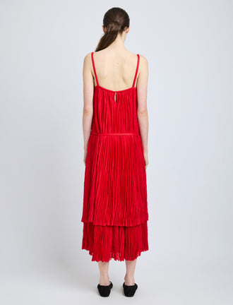 Proenza Schouler Back full length image of model wearing Clyne Dress in Pleated Jersey in Dark Poppy