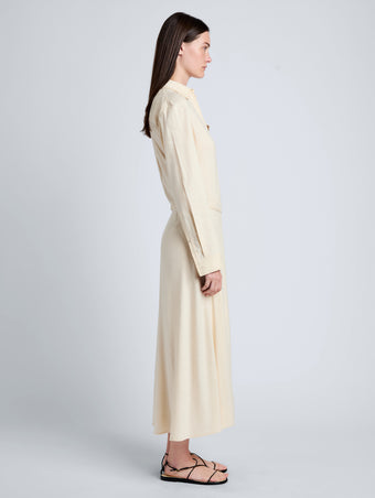 Proenza Schouler Side full length image of model wearing Lato Wrap Dress in Linen Slub in Light Wheat