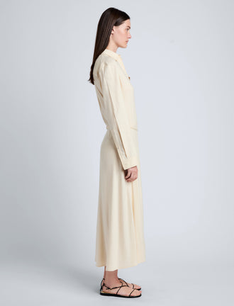 Proenza Schouler Side full length image of model wearing Lato Wrap Dress in Linen Slub in Light Wheat