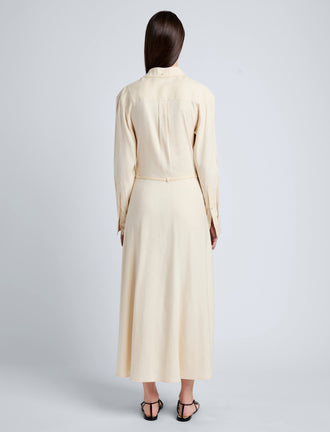 Proenza Schouler Back full length image of model wearing Lato Wrap Dress in Linen Slub in Light Wheat