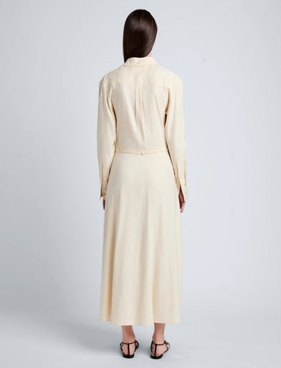 Proenza Schouler Back full length image of model wearing Lato Wrap Dress in Linen Slub in Light Wheat