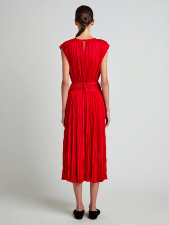 Proenza Schouler Back full length image of model wearing Lyra Top in Pleated Jersey in Dark Poppy