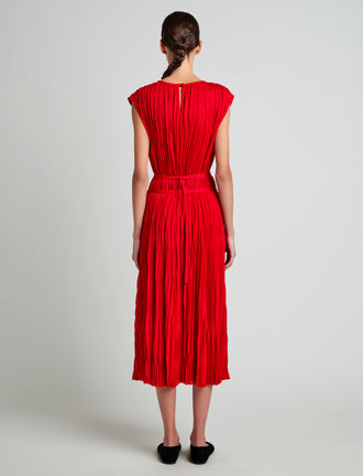 Proenza Schouler Back full length image of model wearing Lyra Top in Pleated Jersey in Dark Poppy