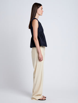 Proenza Schouler Side full length image of model wearing Sullivan Top in Tech Cotton in Navy