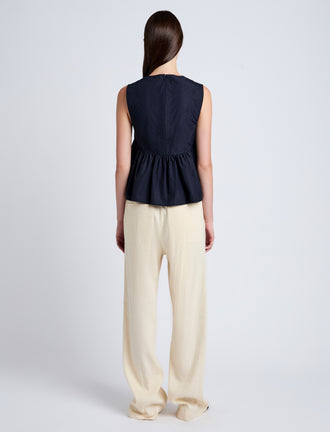 Proenza Schouler Back full length image of model wearing Sullivan Top in Tech Cotton in Navy