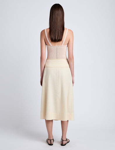 Proenza Schouler Back full length image of model wearing Jovie Wrap Skirt in Linen Slub in Light Wheat