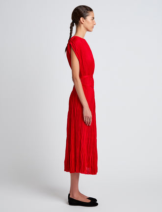 Proenza Schouler Side full length image of model wearing Rosalyn Skirt in Pleated Jersey in Dark Poppy