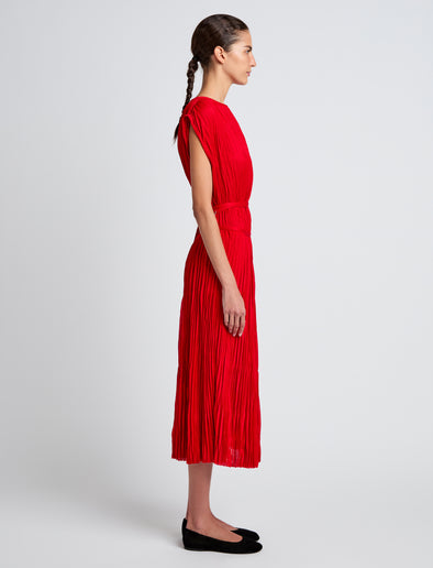 Proenza Schouler Side full length image of model wearing Rosalyn Skirt in Pleated Jersey in Dark Poppy