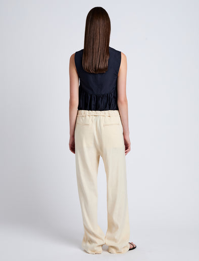 Proenza Schouler Back full length image of model wearing Magnus Pant in Linen Slub in Light Wheat