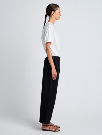 Proenza Schouler Side full length image of model wearing Cali Pant in Stretch Cotton Suiting in Black