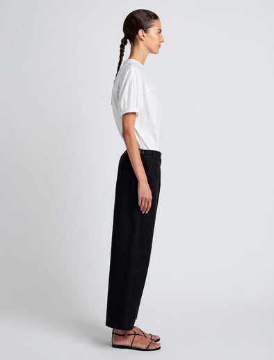 Proenza Schouler Side full length image of model wearing Cali Pant in Stretch Cotton Suiting in Black
