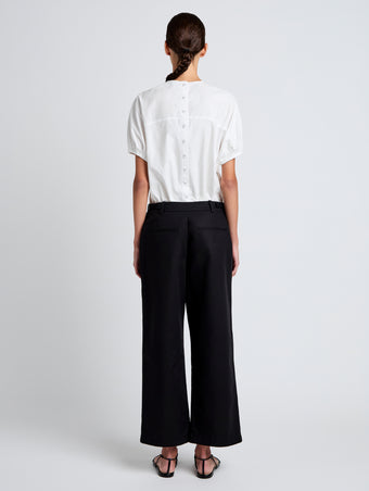 Proenza Schouler Back full length image of model wearing Cali Pant in Stretch Cotton Suiting in Black