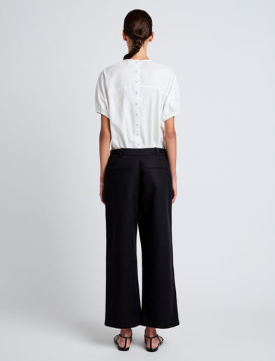 Proenza Schouler Back full length image of model wearing Cali Pant in Stretch Cotton Suiting in Black