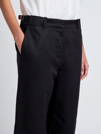 Proenza Schouler Detail image of model wearing Cali Pant in Stretch Cotton Suiting in Black