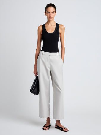 Proenza Schouler Front full length image of model wearing Cali Pant in Stretch Cotton Suiting in Pale Grey