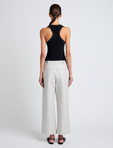 Proenza Schouler Back full length image of model wearing Cali Pant in Stretch Cotton Suiting in Pale Grey
