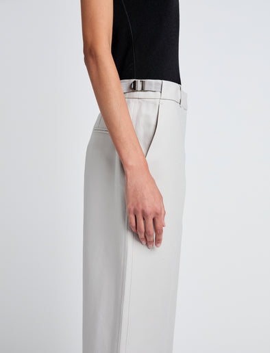 Proenza Schouler Detail image of model wearing Cali Pant in Stretch Cotton Suiting in Pale Grey