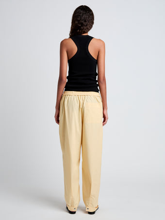 Proenza Schouler Back full length image of model wearing Aston Pant in Tech Cotton in Light Wheat