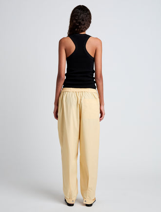 Proenza Schouler Back full length image of model wearing Aston Pant in Tech Cotton in Light Wheat