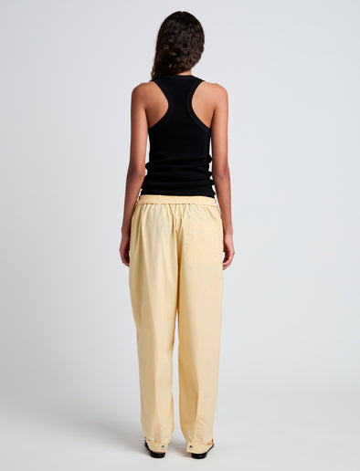 Proenza Schouler Back full length image of model wearing Aston Pant in Tech Cotton in Light Wheat