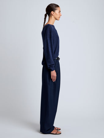 Proenza Schouler Side full length image of model wearing Conley Knit Sweater in Lightweight Merino in Navy Melange