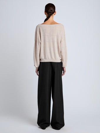 Proenza Schouler Back full length image of model wearing Conley Knit Sweater in Lightweight Merino in Light Rose Melange