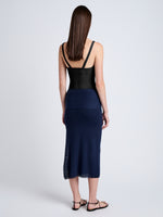 Proenza Schouler Back full length image of model wearing Phelan Knit Skirt in Linen Twist in Navy