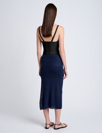 Proenza Schouler Back full length image of model wearing Phelan Knit Skirt in Linen Twist in Navy